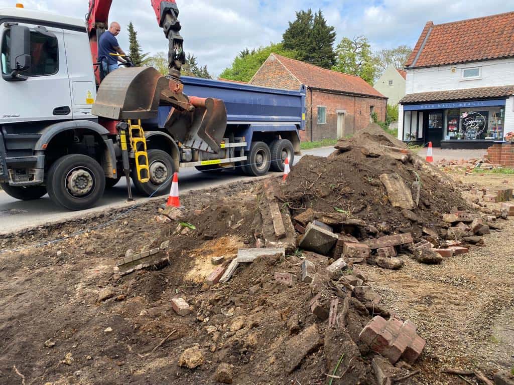 This is a photo of a dig out being carried out for the installation of a new tarmac driveway. Works being carried out by Ely Driveways