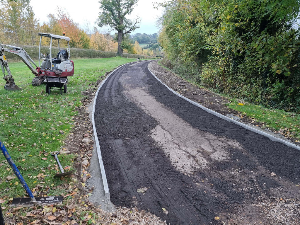 This is a large driveway which is in the process of having a tar and chip driveway installed on by Ely Driveways